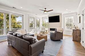 TV - Exceptional luxury retreat steps from the beach with outdoor oasis, heated pool, elevator (North Myrtle Beach)