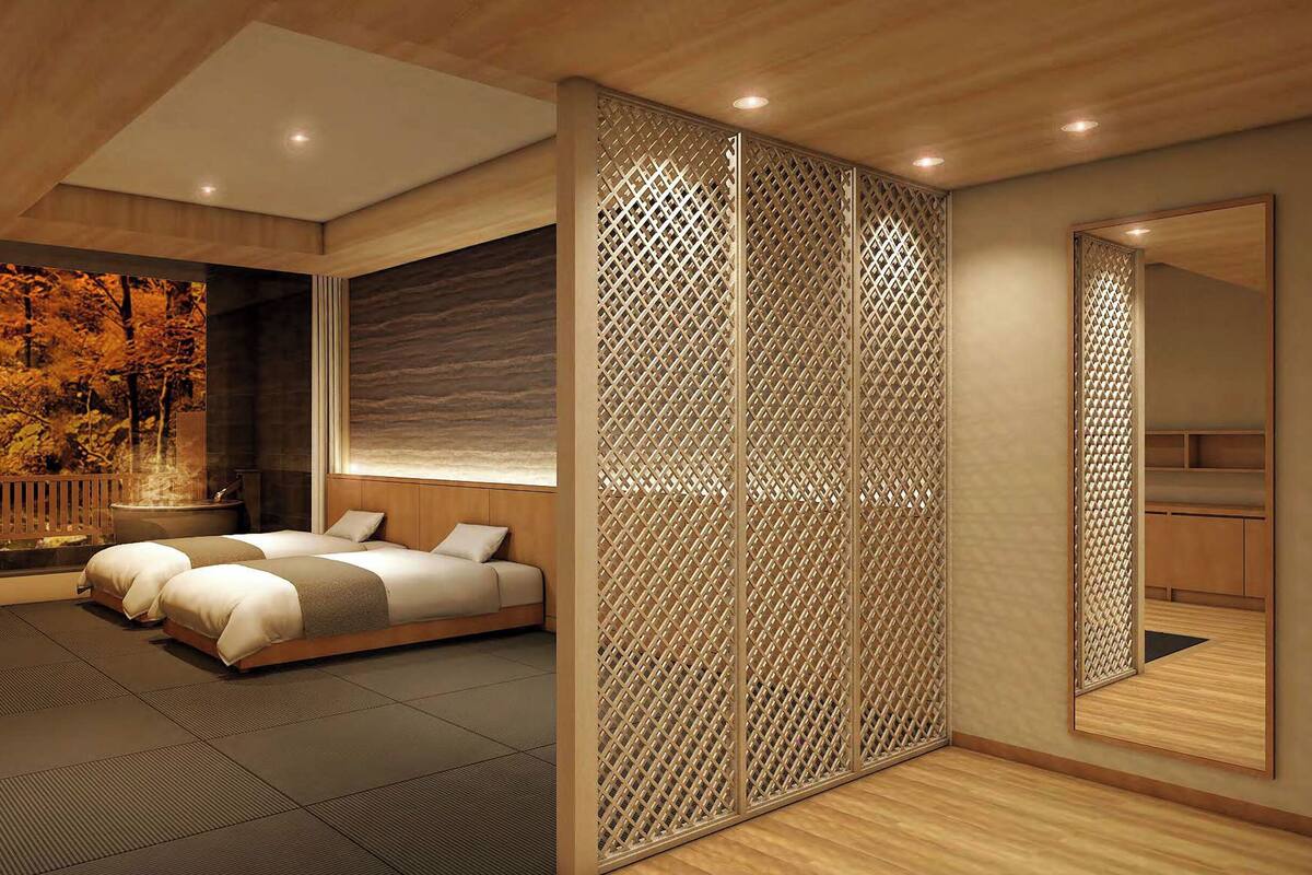 Camera da letto moderna con un letto grande, pavimento in legno, pannello decorativo a parete e uno specchio capiente.