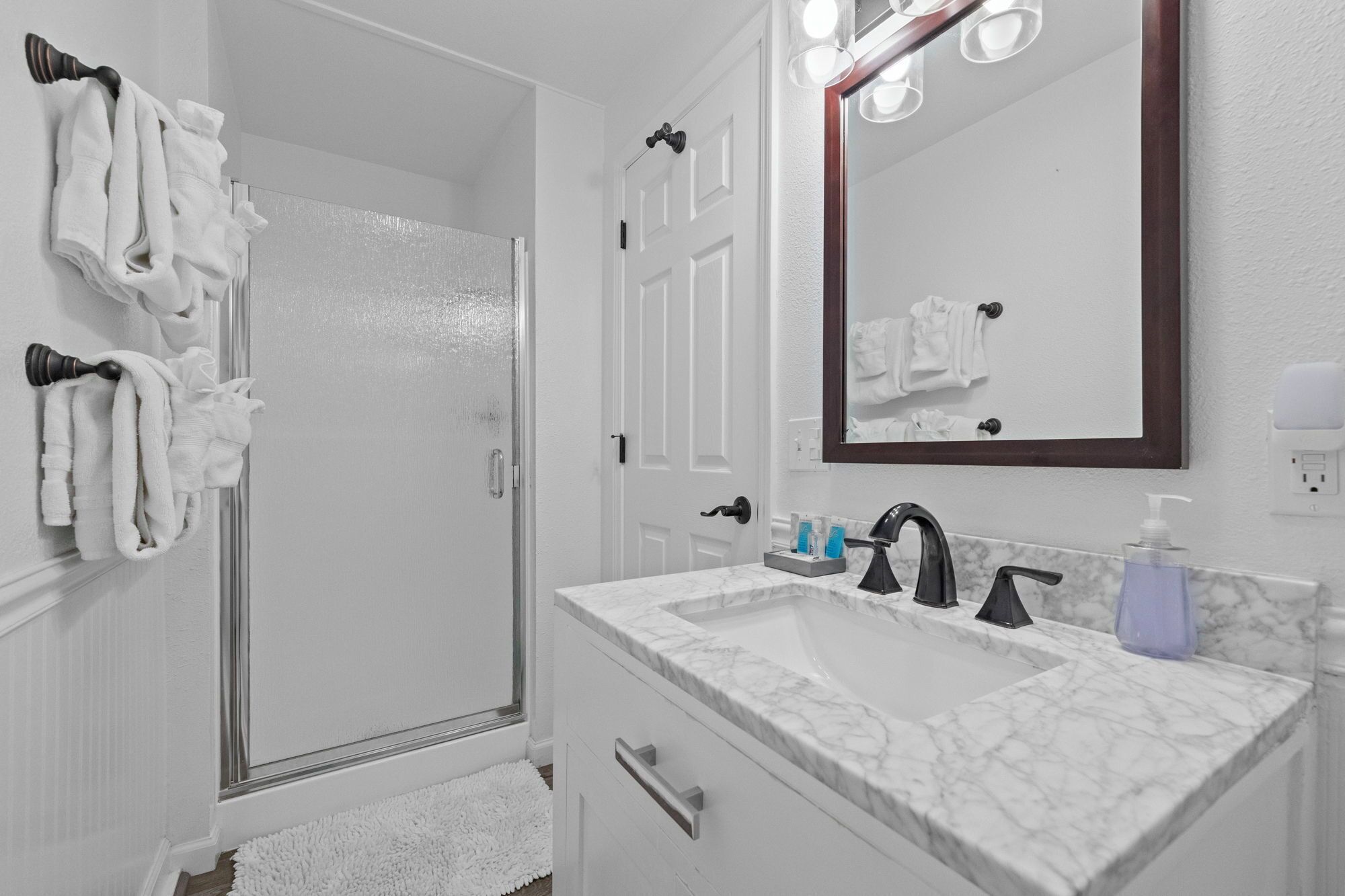 Shower, towels, soap, toilet paper