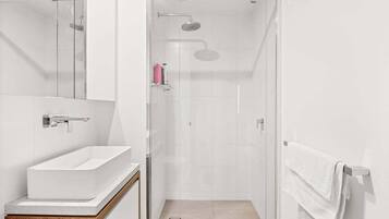 Hair dryer, towels, soap, shampoo