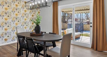 Hot Tub + Fire Pit Swings + Retro Arcade Garage = Fun Modern Stay