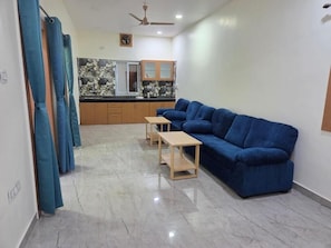 Family Apartment, Garden View | Living area | 36-inch Smart TV with digital channels - D-Avana Bliss Retreat Homestay (Ratu)