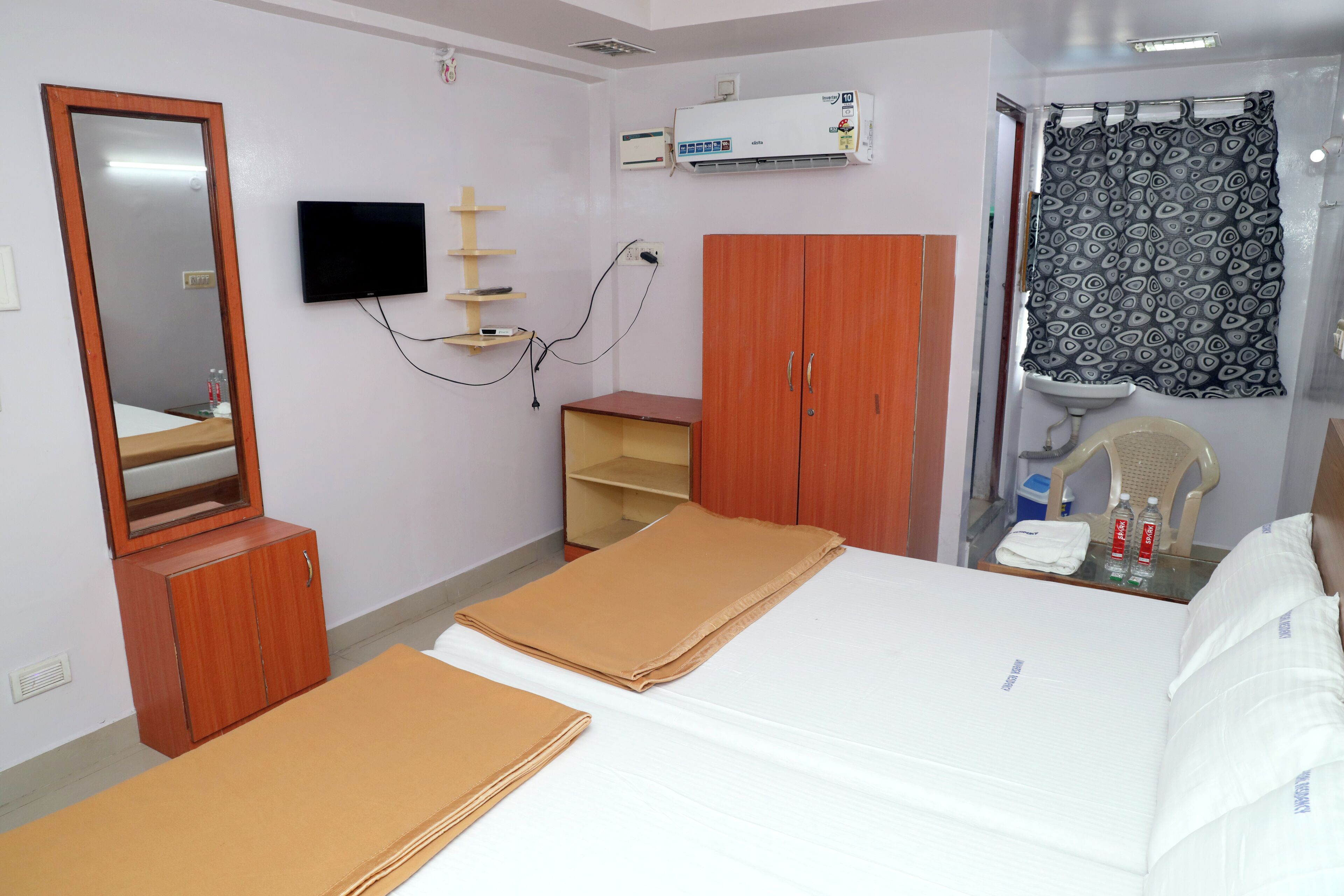 Family Quadruple Room, 2 Double Beds | Living area | 32-inch LED TV with cable channels