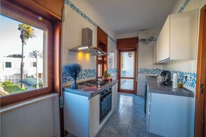 Private kitchen - Tramonto D'oro Apartment Near The Beach (Porto Cesareo)