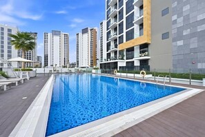 Outdoor pool - Bloomfields Cozy 1BR Azizi Riveria 47 (Dubai)