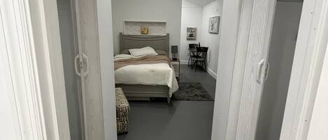 1 bedroom, desk, iron/ironing board, travel crib