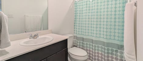 Bidet, towels, soap, toilet paper