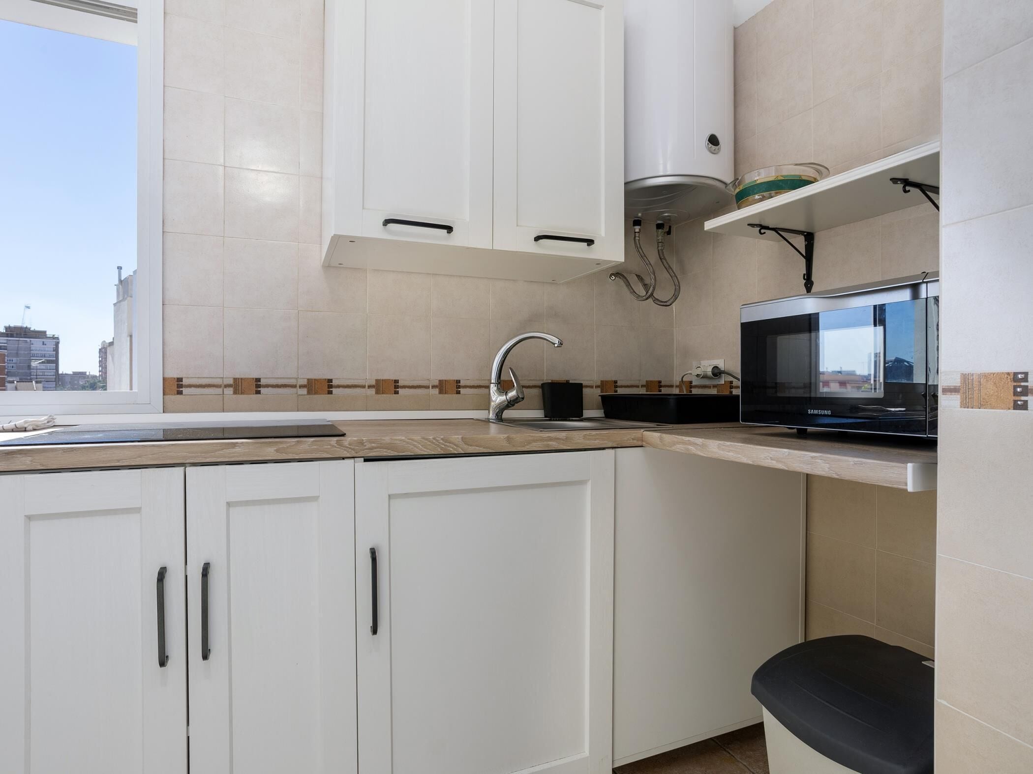 Fridge, microwave, coffee/tea maker, toaster