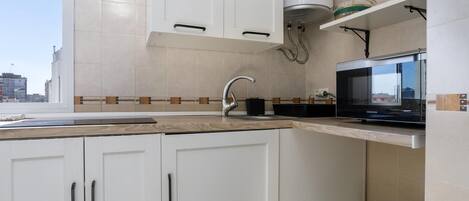 Fridge, microwave, coffee/tea maker, toaster