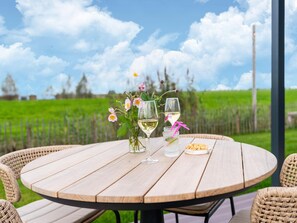 Outdoor dining - Holiday home by the water in the Green Heart (Oud Ade)