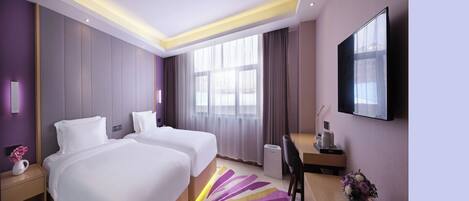 A hotel room with two beds, a desk, a chair, a TV, and a large window with curtains.