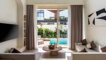 Deluxe Villa, 2 Bedrooms, Balcony, Pool View | Living area | 32-inch Smart TV with digital channels