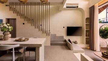 Deluxe Villa, 2 Bedrooms, Balcony, Pool View | Dining room