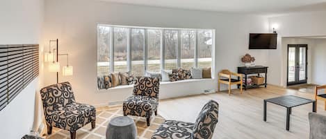 TV, fireplace, books