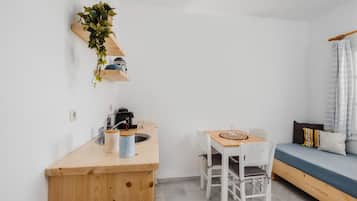 Suite – deluxe, sjøutsikt | Spiseområde