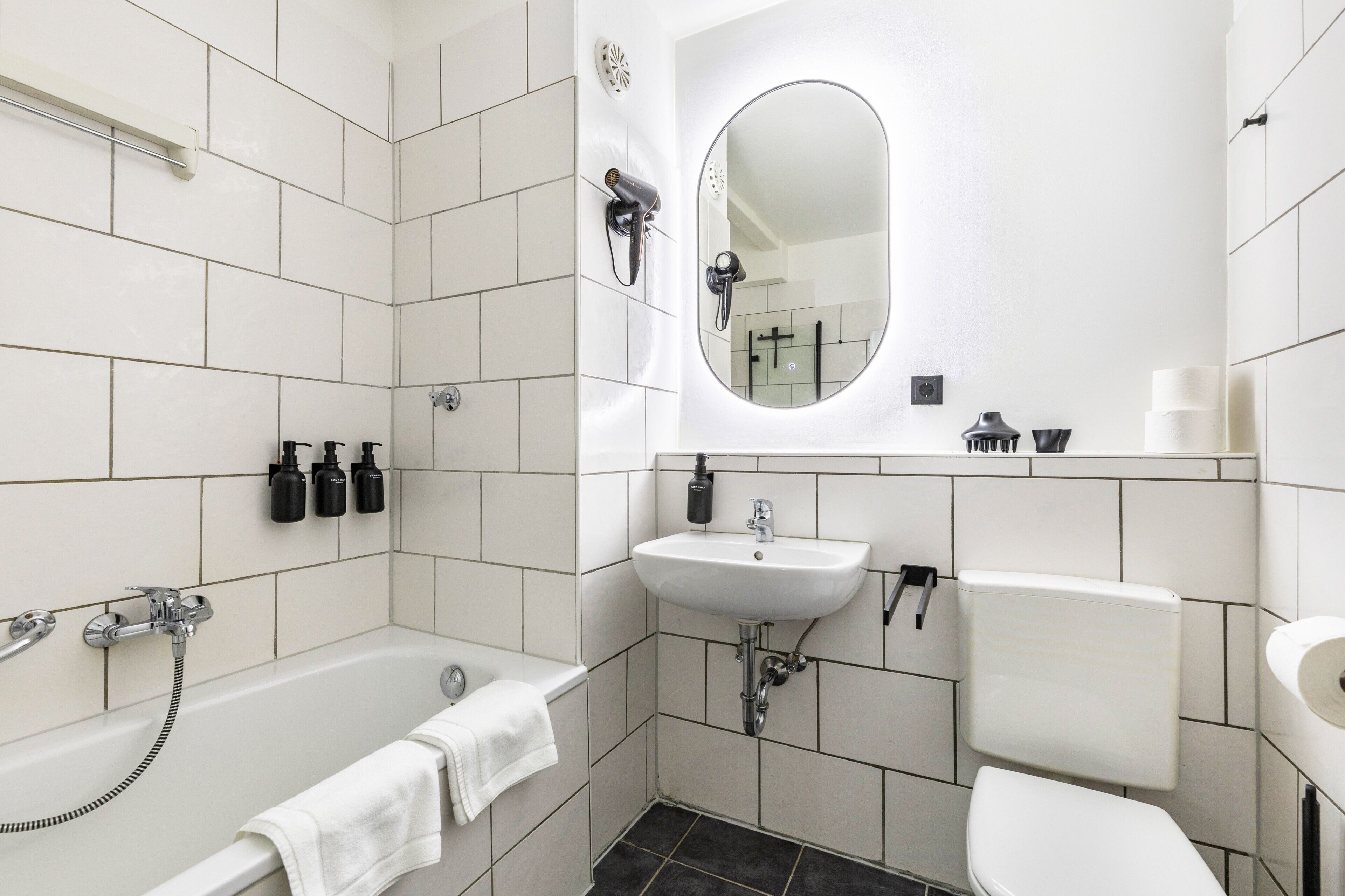 Shower, hair dryer, towels