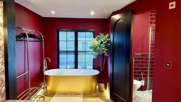 Shower, hair dryer, towels, shampoo