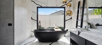 Resort-style family retreat with pool, gym & basketball