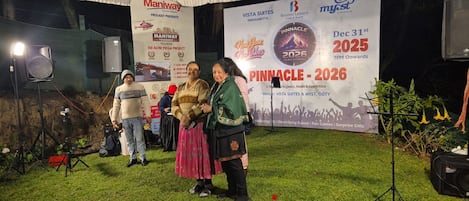 A promotional event with banners for Manipay Township and Pinnacle 2026.