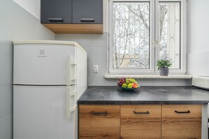 Apartamento Confort, vistas al patio | Cocina privada | Hervidor eléctrico y tostadora