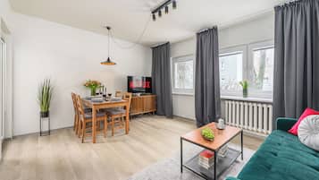 Comfort Apartment, Courtyard View | Living room | 40-inch flat-screen TV with digital channels