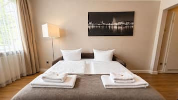 Quadruple Room | In-room safe, free WiFi, bed sheets