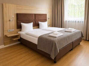 Vierbettzimmer | Zimmersafe, kostenloses WLAN, Bettwäsche