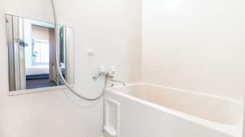 Twin Room | Bathroom | Combined shower/bathtub, hair dryer, towels, shampoo