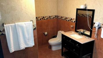 Deluxe Suite, Non Smoking, City View | Bathroom | Towels, soap, shampoo, toilet paper
