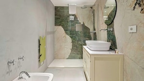 A modern bathroom with a sink, mirror, and shower. - Paradise 1, Marine Lands (Riomaggiore)