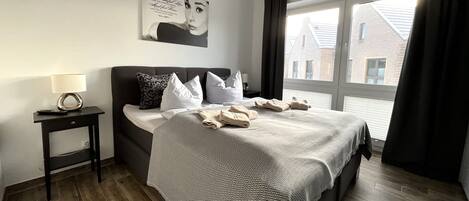 Een strijkplank/strijkijzer, reisbedje, gratis wifi