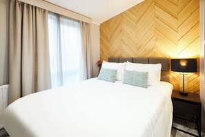 2 dormitorios, tabla de planchar con plancha, wifi y ropa de cama