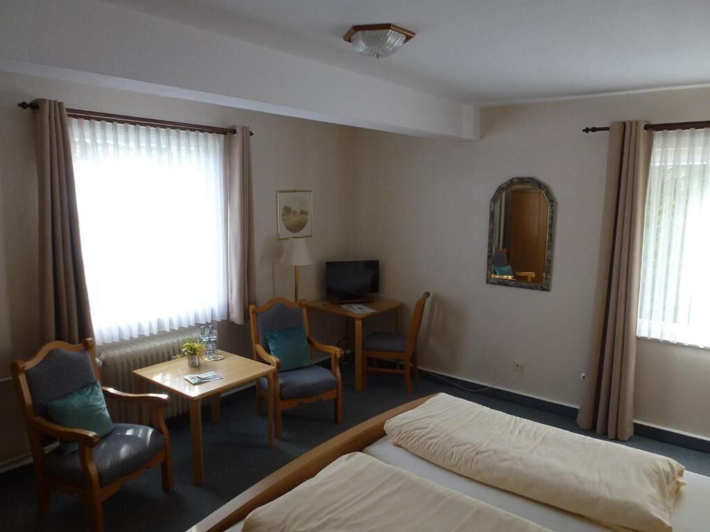 Basic Double Room, Balcony, Garden View | Laptop workspace, free cots/infant beds, free WiFi, bed sheets