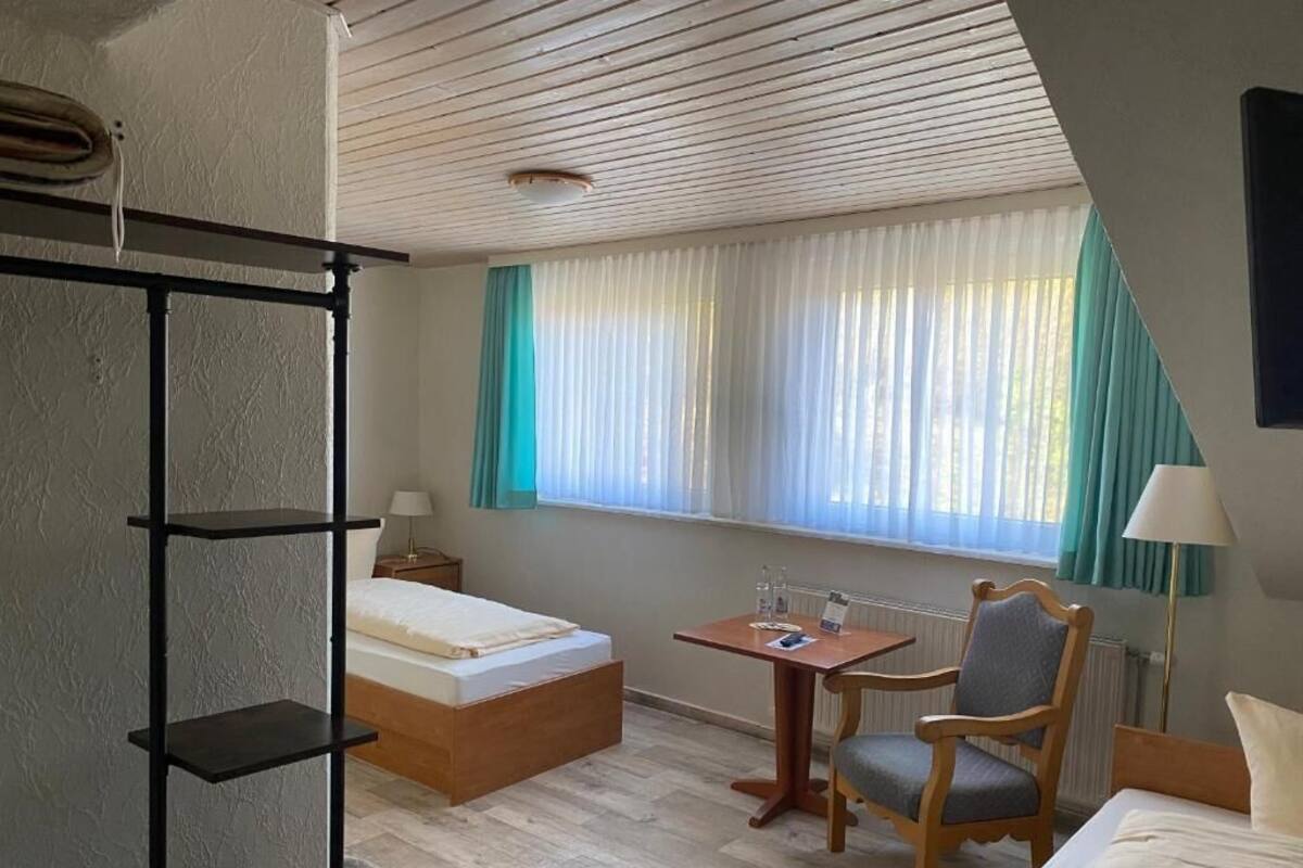 Standard Twin Room, Balcony, Courtyard View | Laptop workspace, free cots/infant beds, free WiFi, bed sheets