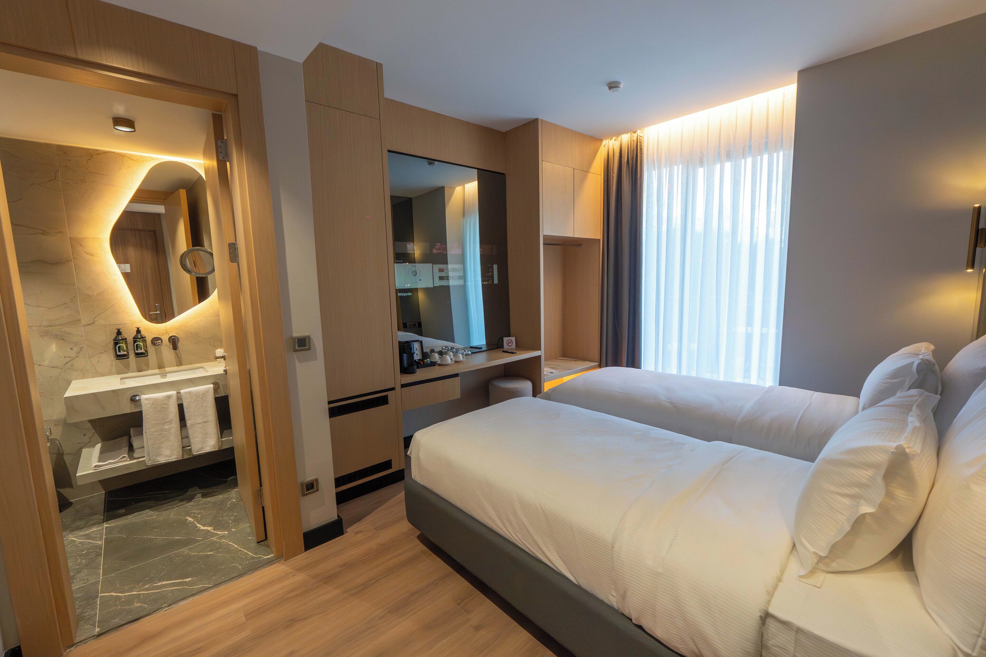 Kahden hengen standard-huone (kaksi sänkyä), parveke | Tallelokero huoneessa, ilmainen Wi-Fi