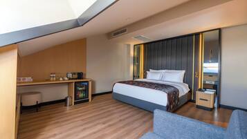 Suite, 1 habitación | Sábanas de algodón egipcio y ropa de cama de alta calidad