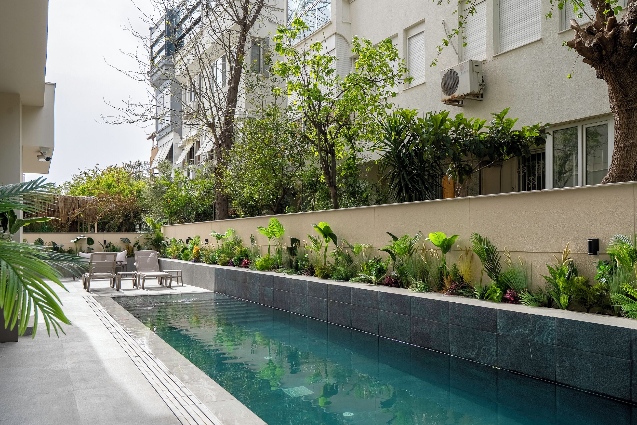 Seasonal outdoor pool, pool umbrellas, sun loungers