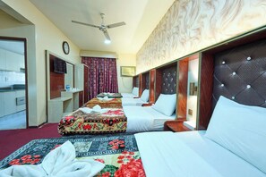 Deluxe Quadruple Room, City View | Living area - Quality Hotel Apartments (Dubai)