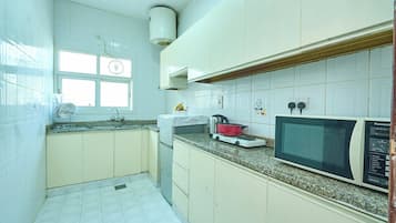 Mini-fridge, cookware/dishes/utensils