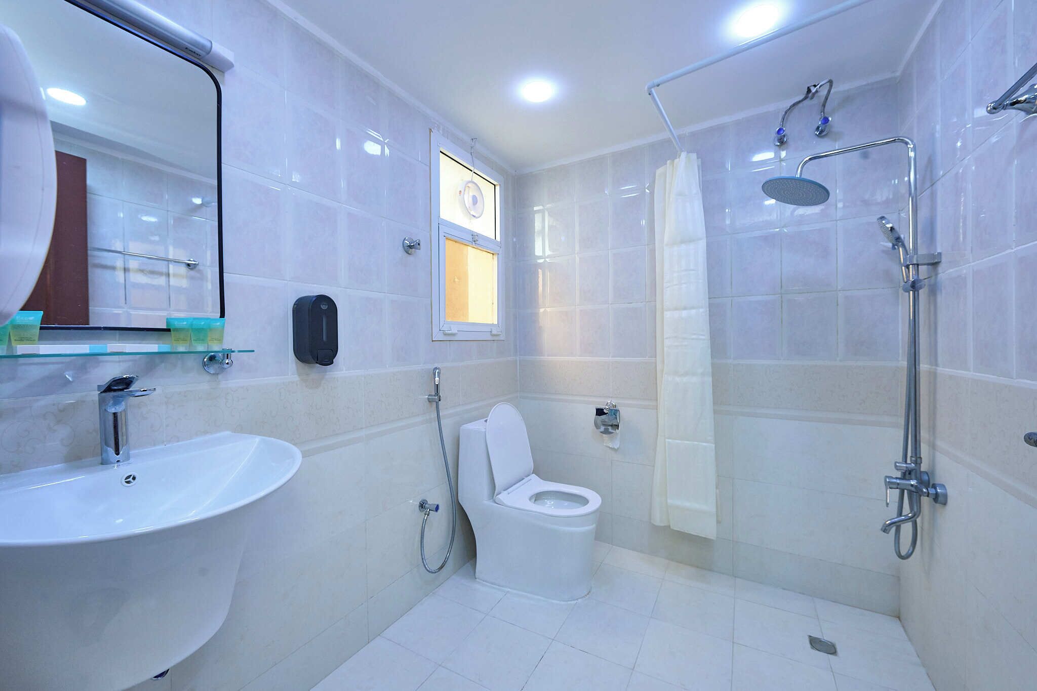 Shower, free toiletries, hair dryer, slippers