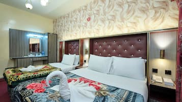 Family Room, City View | Desk, laptop workspace, iron/ironing board, free WiFi