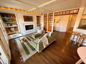 Smart TV, fireplace, books