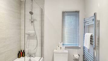 Hair dryer, towels, soap, shampoo