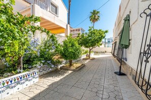 Departamento Confort, patio, vista al jardín | Áreas de la propiedad