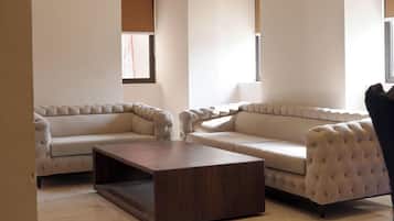 Superior Room, City View | Living area