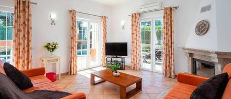 Familienvilla, Gartenblick | Wohnbereich