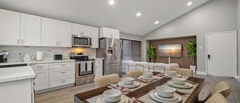 Coffee/tea maker, fridge, microwave, oven