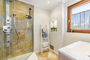 Shower, free toiletries, hair dryer, towels