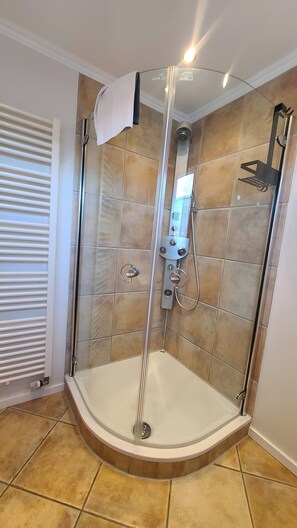 Shower, free toiletries, hair dryer, towels