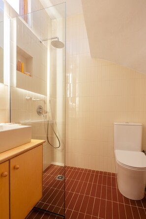 Shower, eco-friendly toiletries, hair dryer, towels
